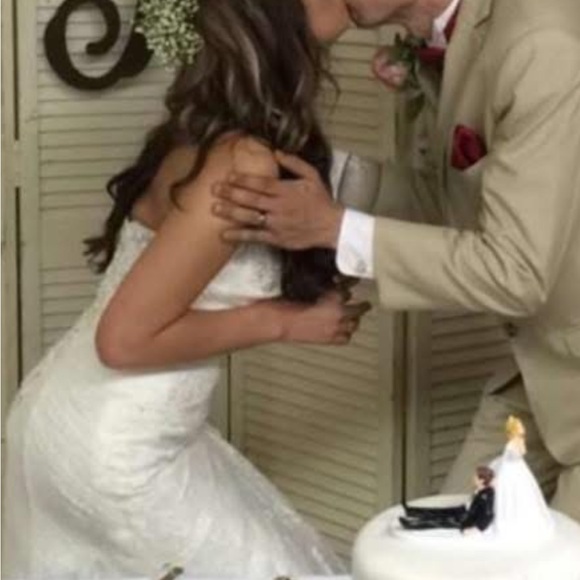 David's Bridal Lace Strapless Wedding Gown in the color “Ivory”. - Picture 7 of 16